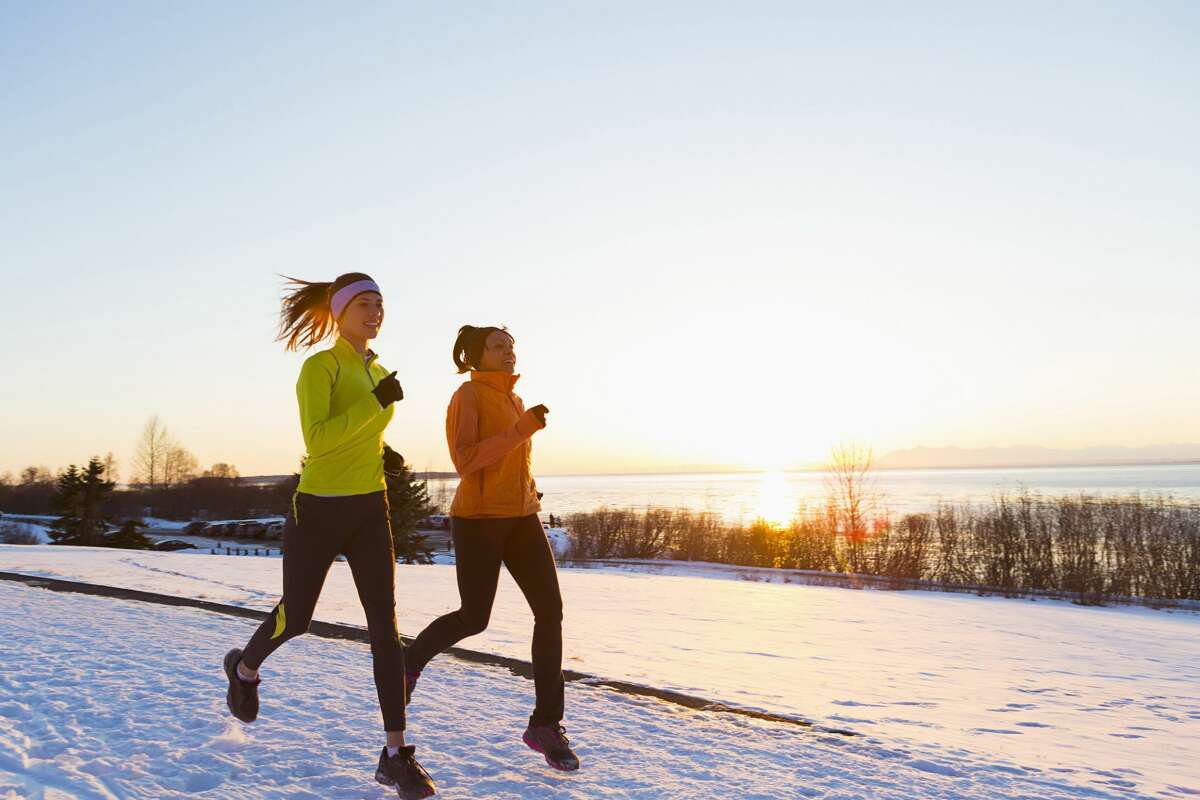 One way to stay motivated on your fitness journey is to get a running buddy for winter runs.