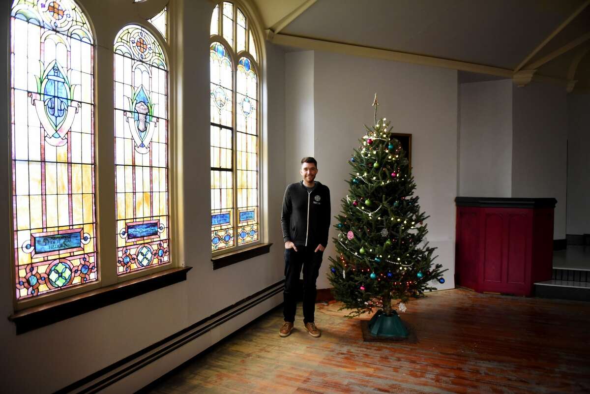 Brian Bandle with the Christmas tree he bought online for $250 on Friday, Dec. 3, 2021, at his home in Brunswick, N.Y. He thought he was ordering a nice artificial tree that he could reuse in years to come, but it turned out to be a real one. He tried selling it on social media and, while he didnÃ?•t sell it, the tree became a 'thing' with one person giving him a stand to keep the tree, another sending him decoration from New Orleans. (Will Waldron/Times Union)