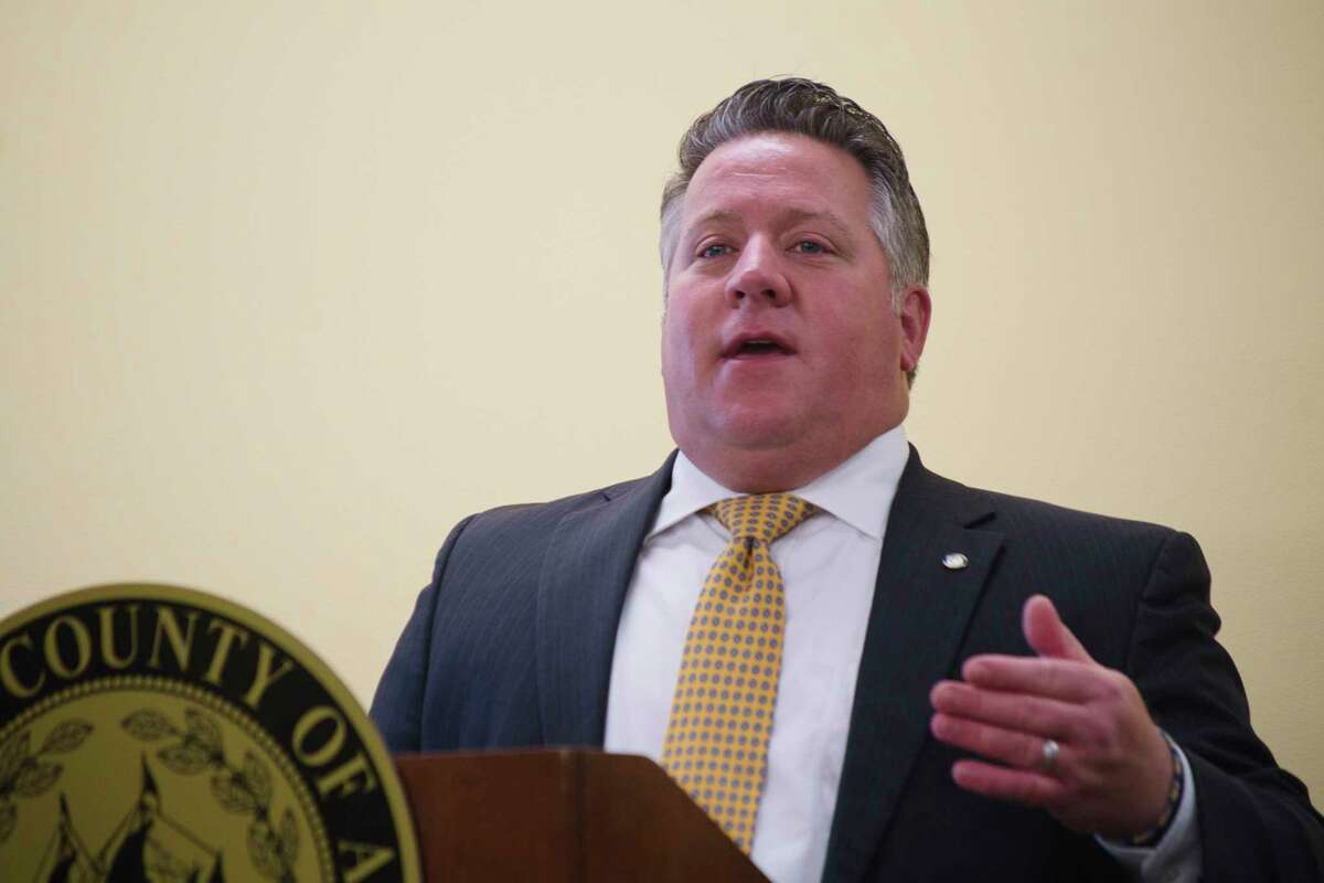 Albany County Executive Dan McCoy speaks at an event at the Albany County Probation Department on Monday, Dec. 13, 2021, in Albany, N.Y. County Executive McCoy announced a new program in the probation department where those on probation can earn their GED.