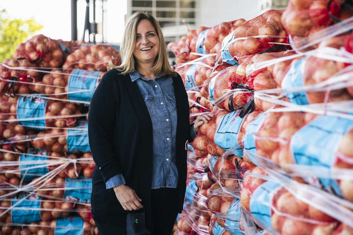 Tanis Crosby, executive director at the San Francisco-Marin Food Bank, stands for a portrait in San Francisco, Calif. May 3, 2021. The Chronicle’s Season of Sharing Fund distributes 15% of its contributions to food banks serving the nine Bay Area counties.