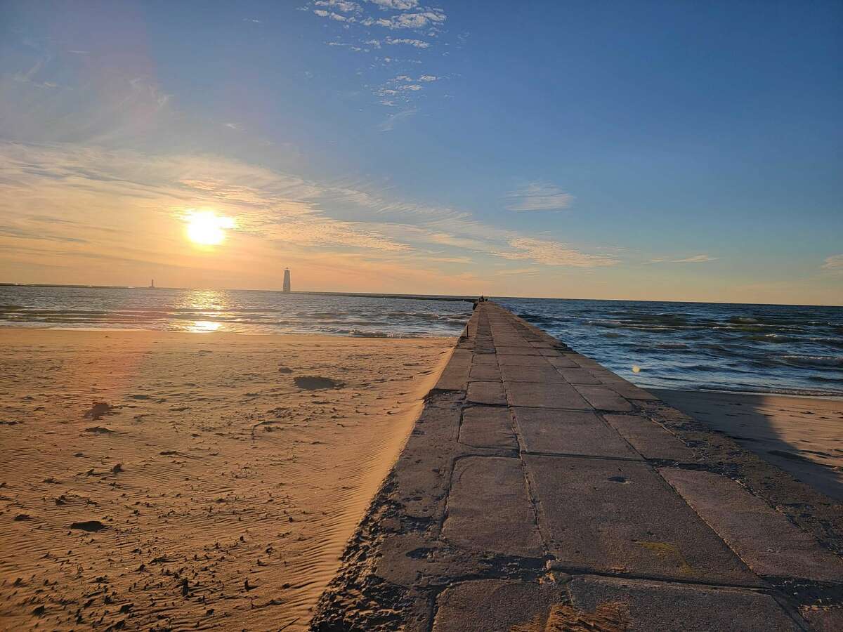 The Benzie County Sheriff's Office is calling a report of a person falling off the pier Sunday evening into stormy waters at Frankfort beach unfounded. 