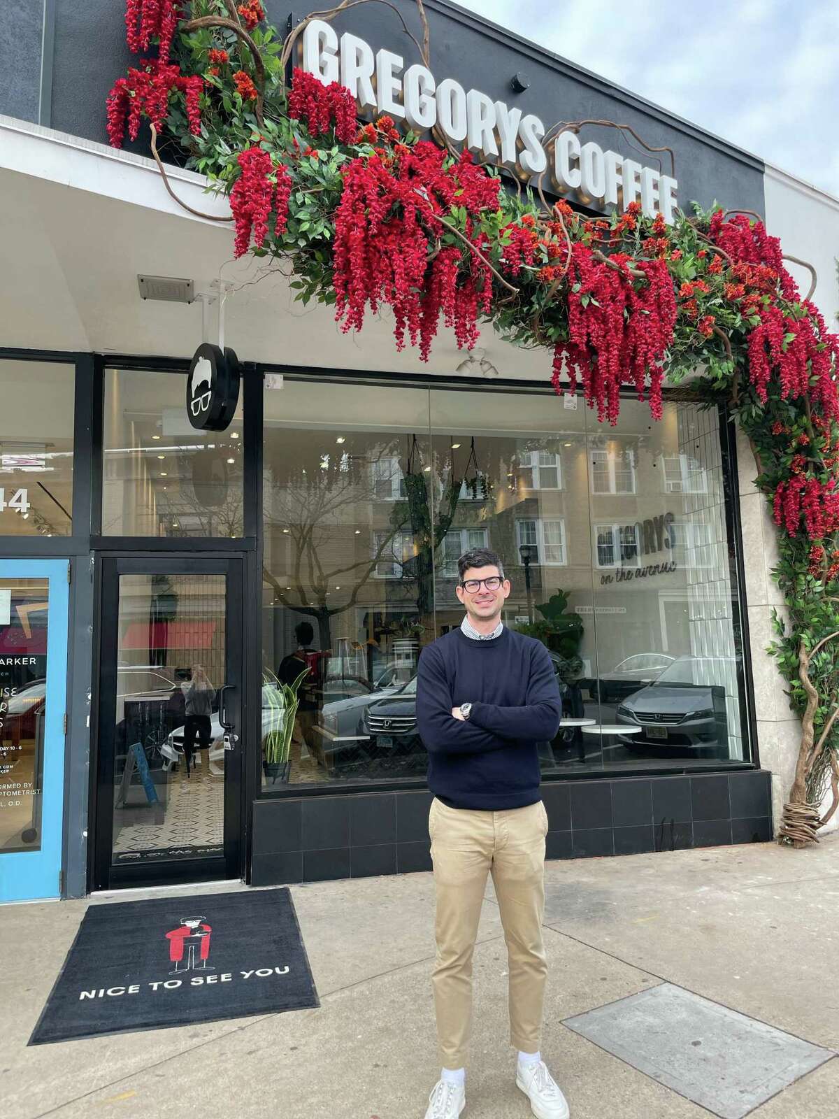 Gregory Zamfotis, founder and CEO of Gregorys, stands outside the new Gregorys Coffee shop at 342 Greenwich Ave., in Greenwich, Conn.