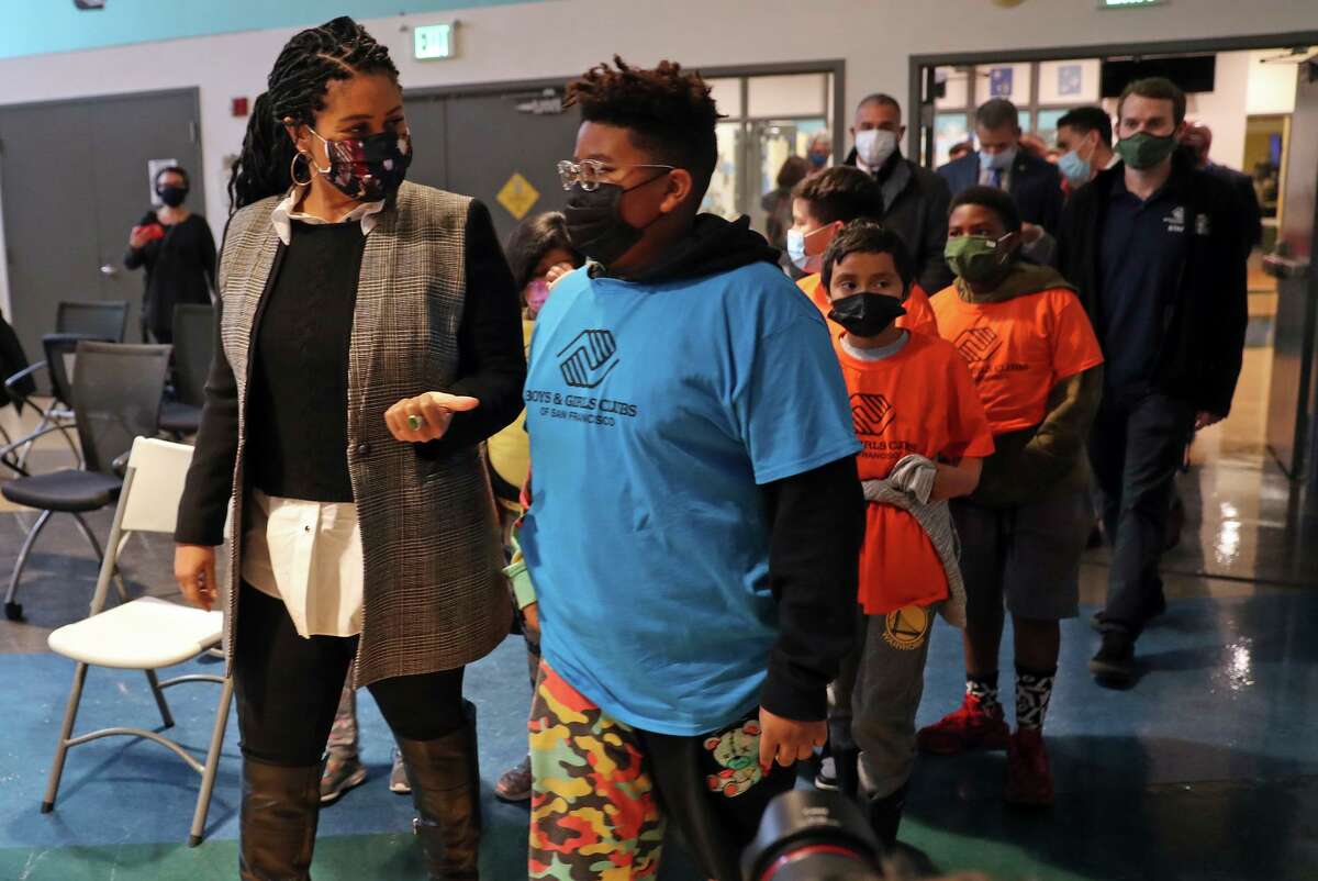 Mayor London Breed walks with children at the Boys & Girls Club of San Francisco before announcing a new ballot initiative to support children and families.