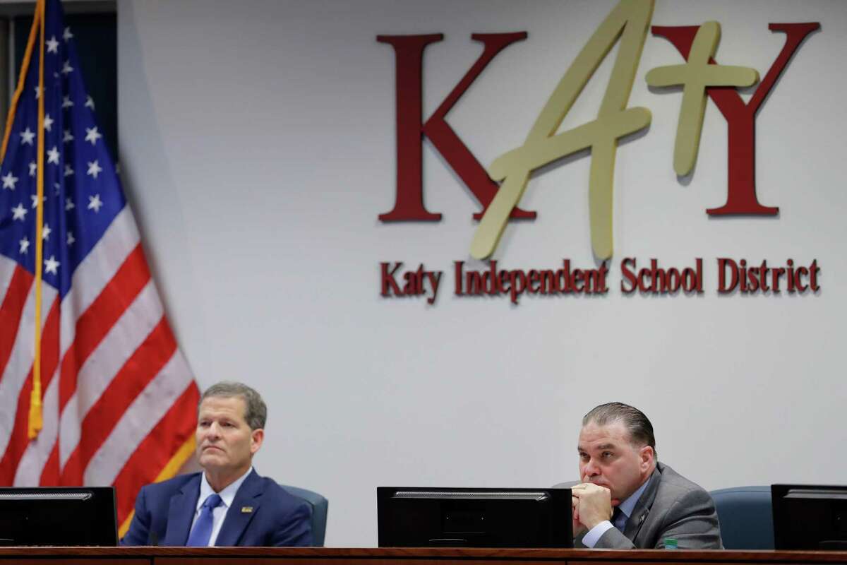 Board president Greg Schulte, left, and superintendent Dr. Ken Gregorski, right, listen during public comments about the district policy on blocked access to LGBTQ+ websites and library materials during a meeting of the Katy ISD school board Monday, Dec. 13, 2021 in Katy, TX.