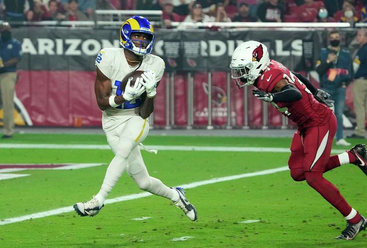 Rams wide receiver Van Jefferson hauls in a touchdown catch behind Cardinals safety Jalen Thompson in the second half.