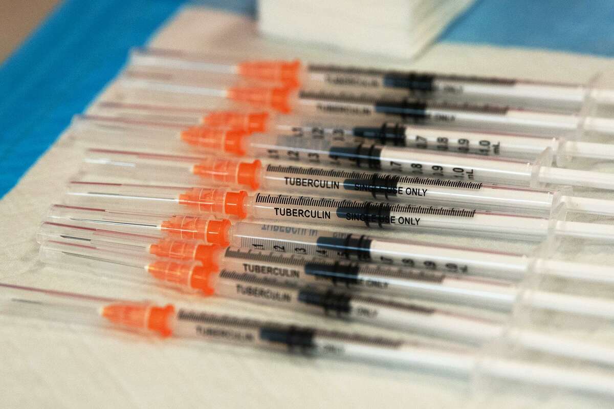 Prison medical staff are not required to obtain an exemption if they choose not be vaccinated against COVID-19 and are instead allowed to test weekly while they continue working. Above, syringes filled with the Moderna COVID-19 vaccine.