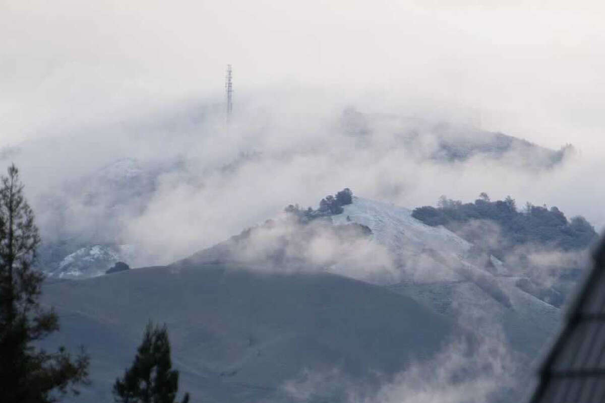 Ryan Fitzsimons photographed the coating of snow covering the peak of Mount Diablo on Tuesday morning,  Dec. 14, 2021.