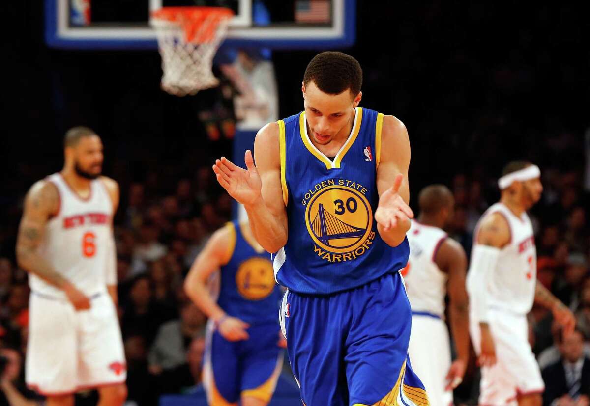 NEW YORK, NY - FEBRUARY 27: (NEW YORK DAILIES OUT) Stephen Curry #30 of the Golden State Warriors celebrates after scoring against the New York Knicks at Madison Square Garden on February 27, 2013 in New York City. The Knicks defeated the Warriors 109-105. NOTE TO USER: User expressly acknowledges and agrees that, by downloading and/or using this Photograph, user is consenting to the terms and conditions of the Getty Images License Agreement. (Photo by Jim McIsaac/Getty Images)