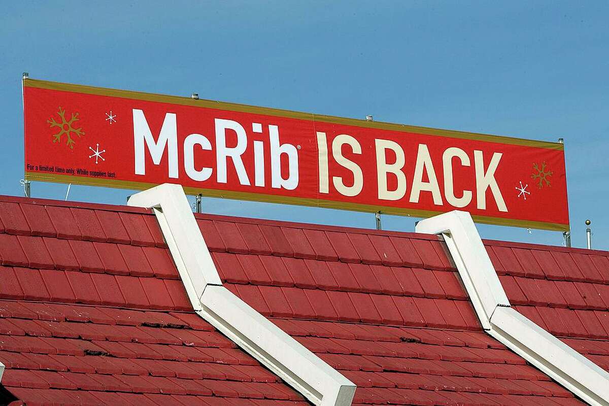 A McDonald’s sign announces the return of the McRib to the menu.