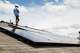 A worker installs solar panels on a home in 2017 file photo. A lawsuit filed by Texas Attorney General Ken Paxton targets a San Antonio solar company that appears to no longer be in business.