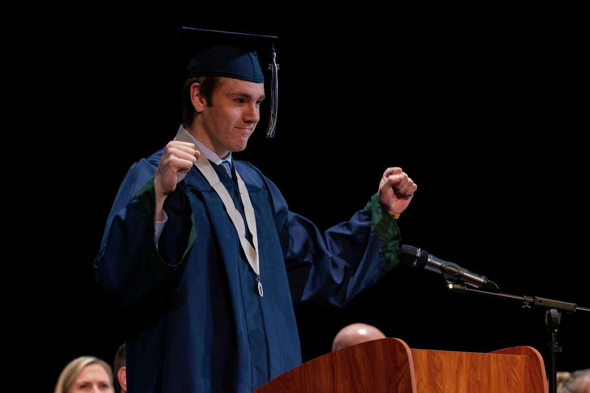 Cody Mladenka, a December 2021 graduate of The Woodlands College Park High School, leads his fellow graduates in the turning of the tassels. Conroe Independent School District graduated 87 students at its winter 2021 commencement on Monday, Dec. 13.