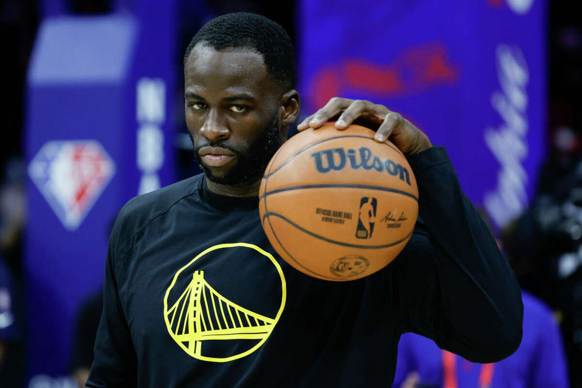 Draymond Green of the Golden State Warriors warms up before playing against the Philadelphia 76ers.