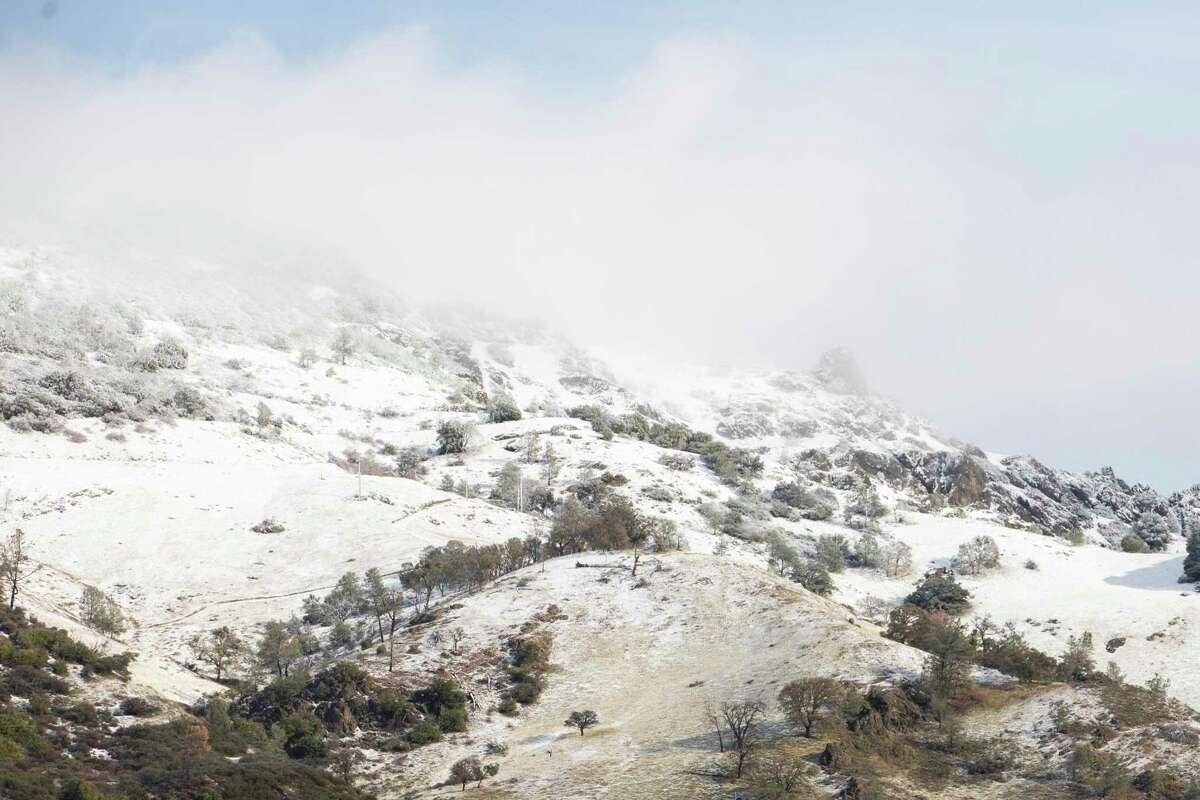 Snow lightly covers the the summit of Mount Diablo in Walnut Creek, Calif. Tuesday, Dec. 14, 2021.