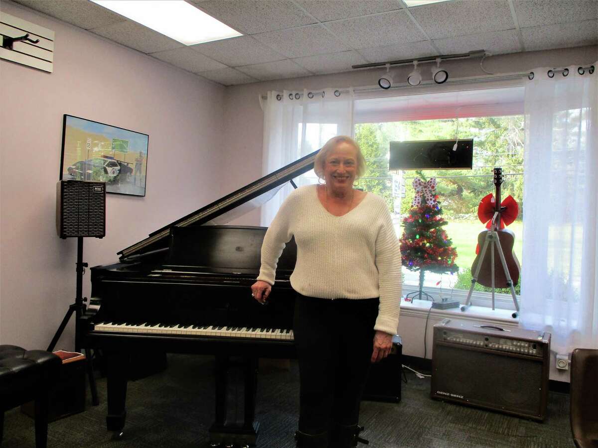Jennifer Johnson Osborne at the piano near her studio in Litchfield.