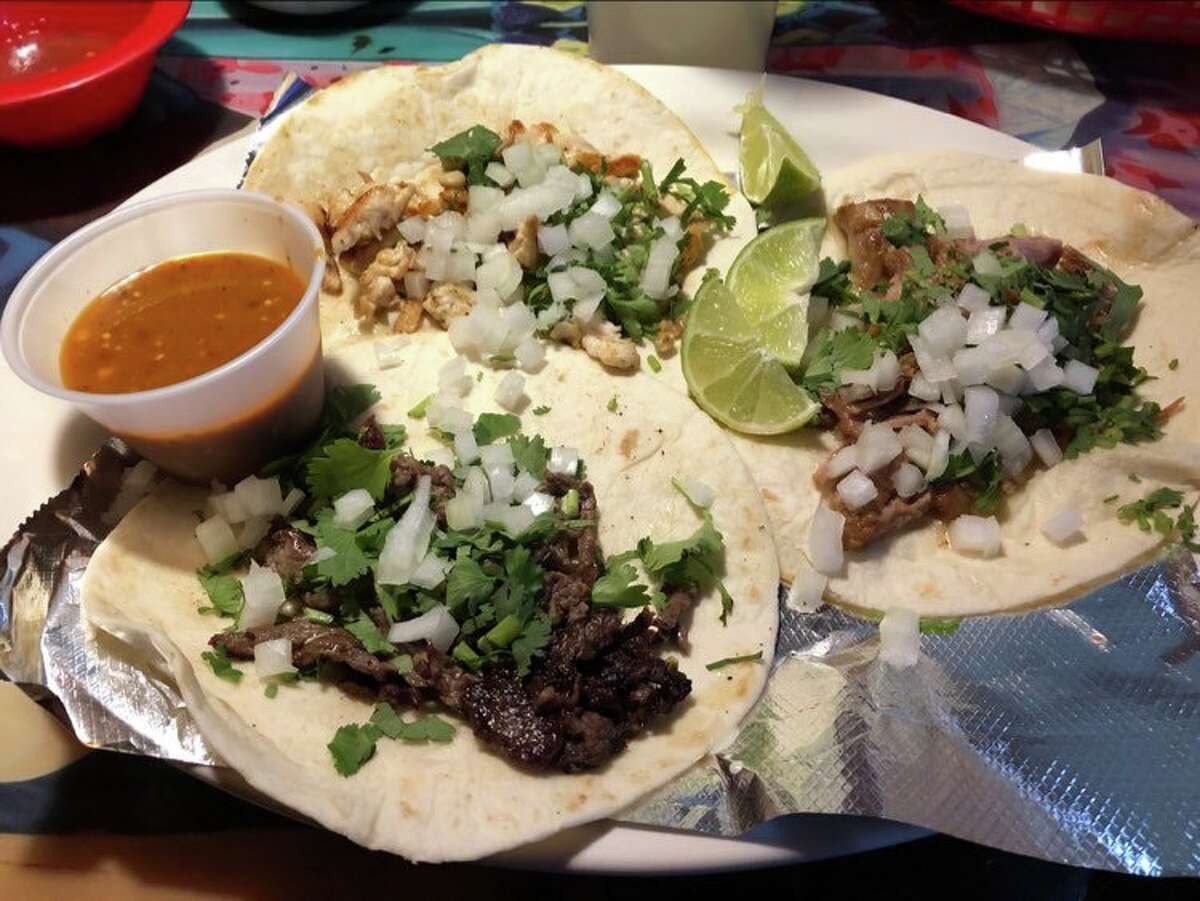 Pictured are the street tacos at Entre Amigos. I chose the grilled steak, grilled chicken and pork carnitas.