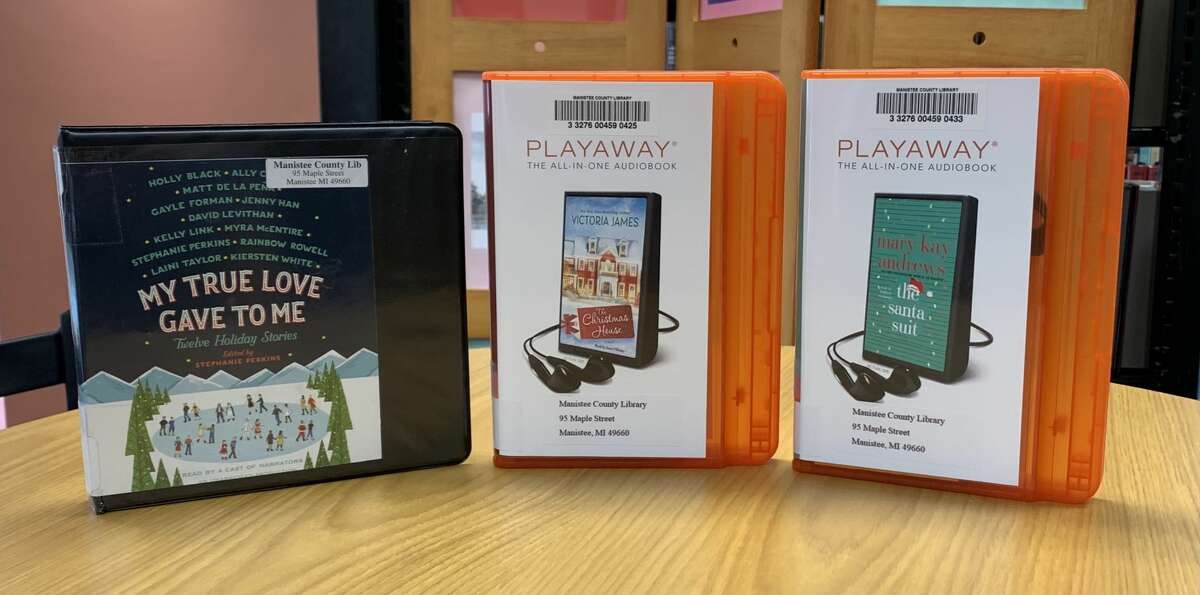 From left to right, the audiobooks "My True Gave To Me: Twelve Holiday Stories" by Stephanie Perkins, "The Chrismas House" by Victoria James and "The Santa Suit" by Mary Kay Andrews. 