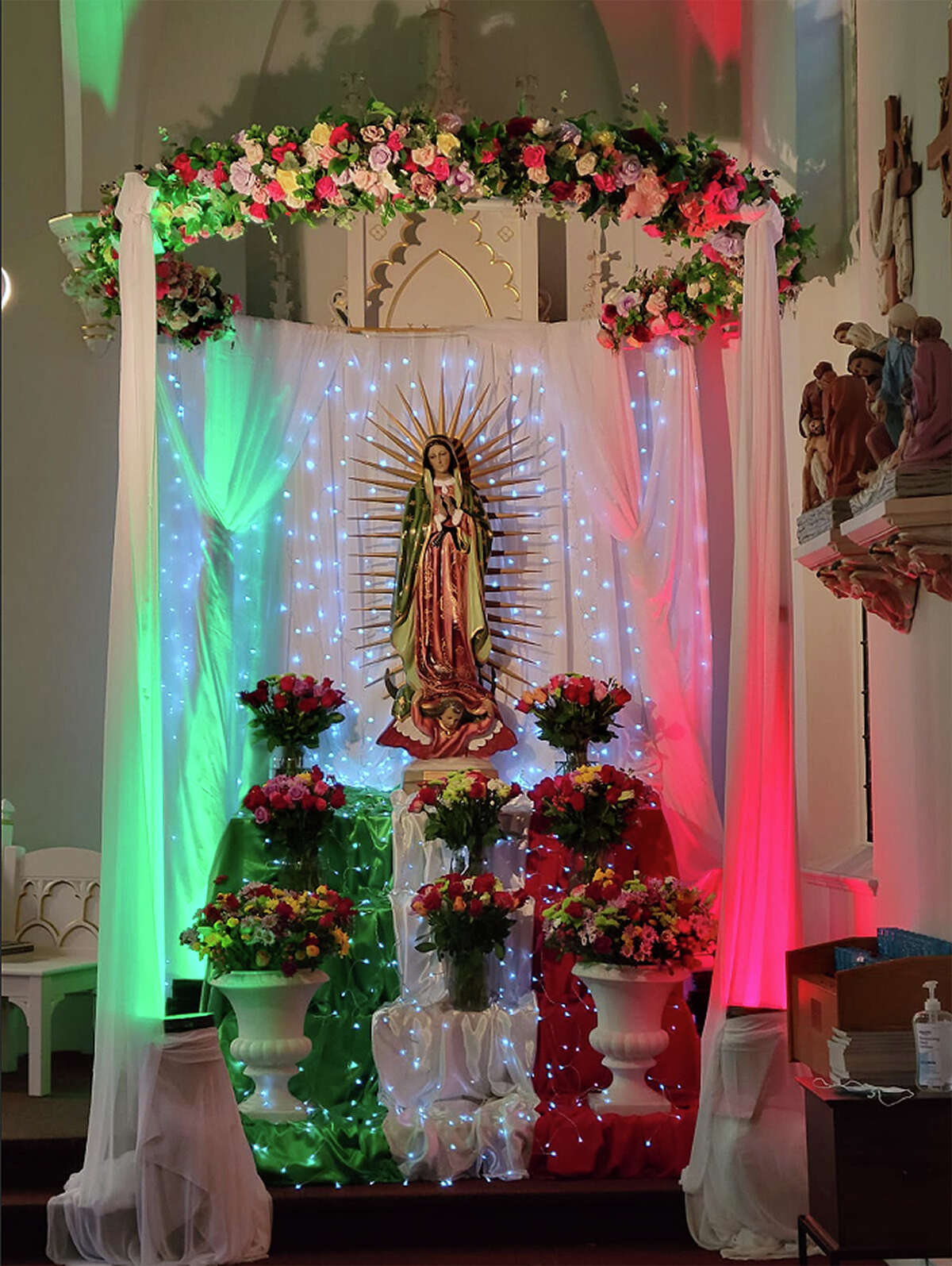 The Hispanic community of St. Alexius Catholic Church in Beardstown, under the direction of Avela Rodriguez and Vianney Torres, decorated an altar for the celebration of the Feast of Our Lady of Guadalupe on Sunday. 