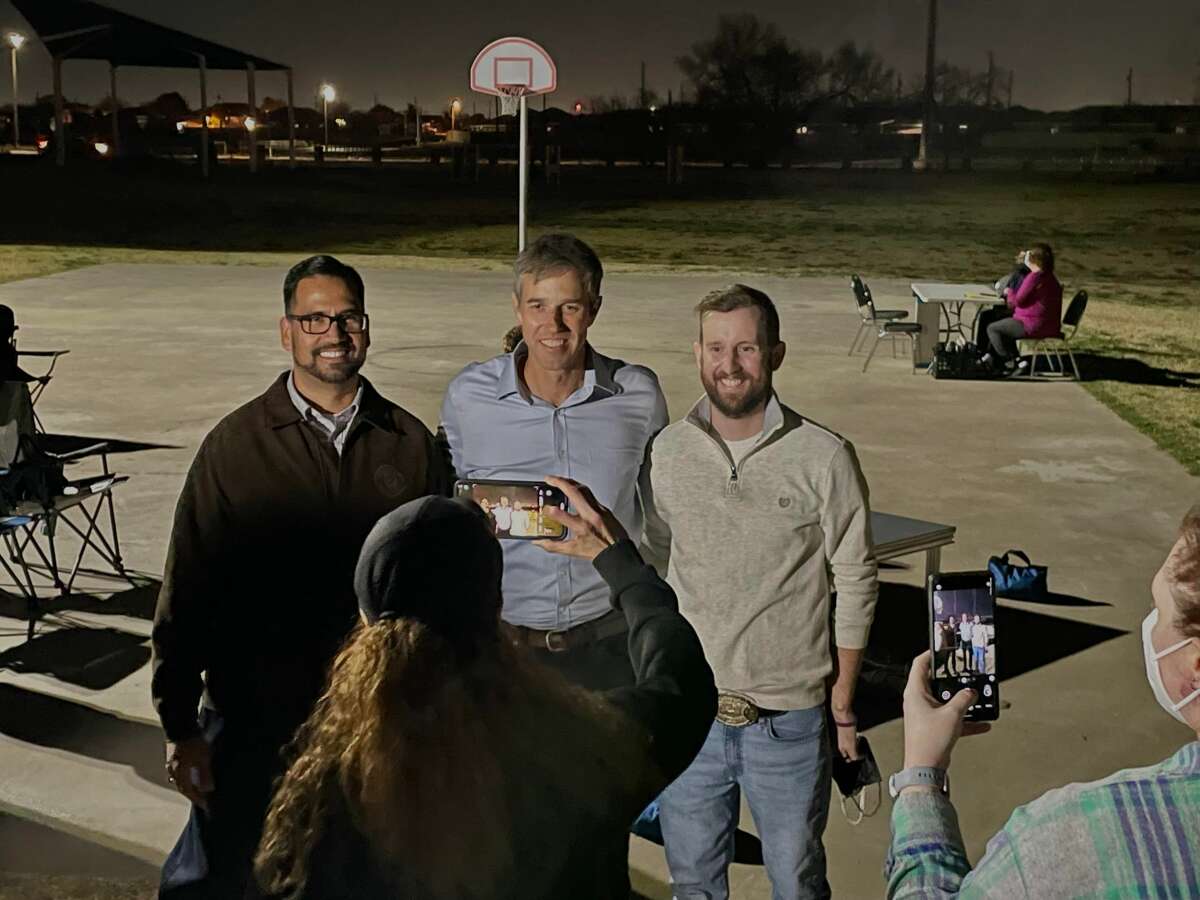 Midland County Commissioner Luis Sanchez, left, gubernatorial candidate Beto O’Rourke, and Andrews County Attorney Sean Galloway, right, pose for a picture Tuesday, Dec. 14, 2021.