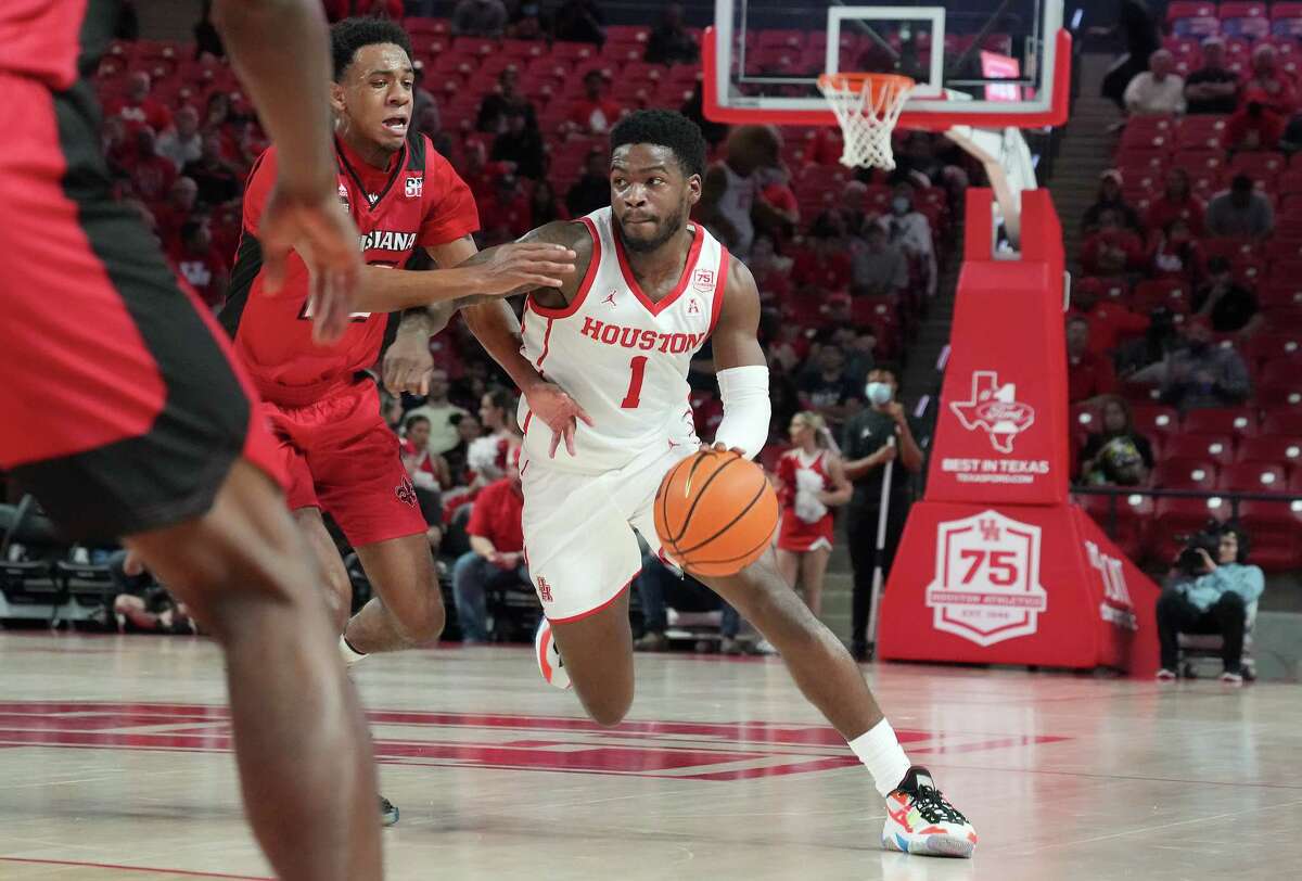 Houston Cougars guard Jamal Shead (1) drives the ball up the court against the Louisiana Lafayette Ragin Cajuns at the UH Fertitta Center in Houston on Tuesday, Dec. 14, 2021.