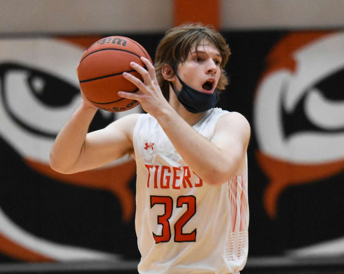 Edwardsville's Shaun Pacatte makes a  play during the fourth quarter against Althoff on Tuesday inside Lucco-Jackson Gymnasium.