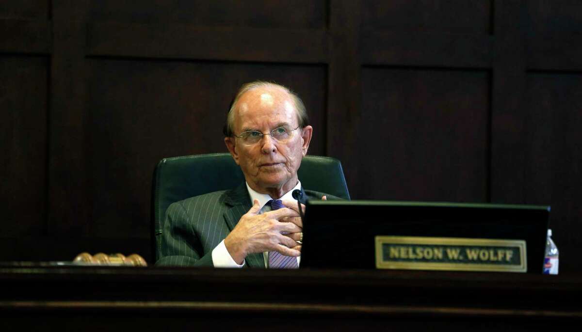 Bexar County Judge Nelson Wolff talks to commissioners during an August session of Commissioners Court. Wolff has announced that he won’t be running for re-election. The closer you look at the 2022 race to replace him, the fuzzier the picture gets.