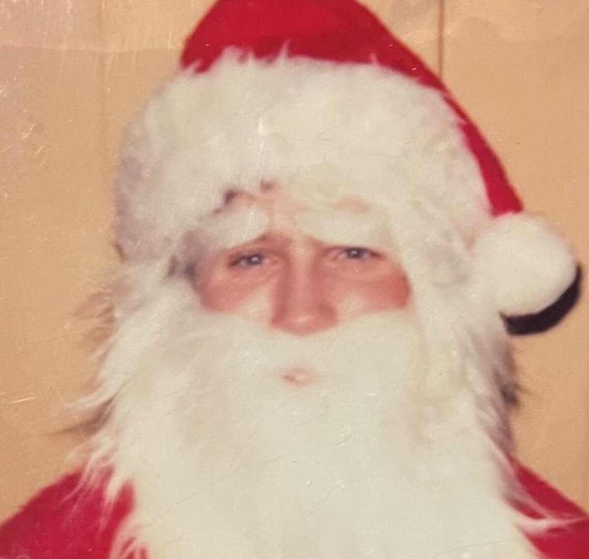 A 14-year-old David Lipe, now 55, dressed as Santa Clause for Granite City North High School. Students could get their photo taken with Santa for $1. His mom has saved this image all these years.