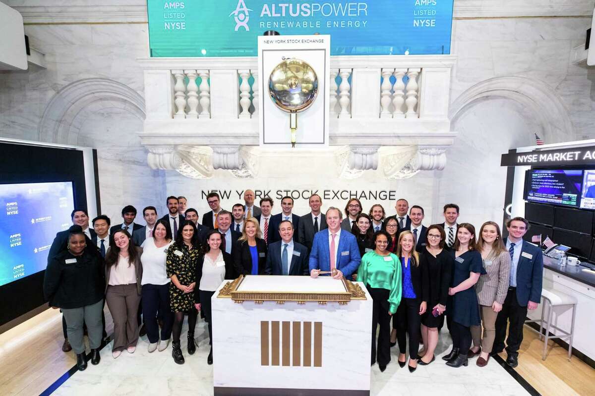 Executives and staff of Altus Power on Friday, Dec. 10, 2021, at a ceremony to ring the opening bell of the New York Stock Exchange in New York City.