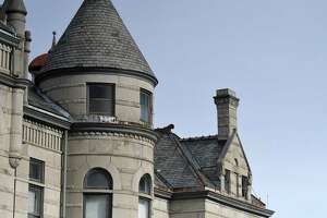The roofline at Cohoes City Hall on Wednesday, Dec. 15, 2021, in Cohoes, N.Y. Cohoes will receive $3 million to pay for renovations to city hall. Projects include replacement of 330 windows and repairs to the slate roof.