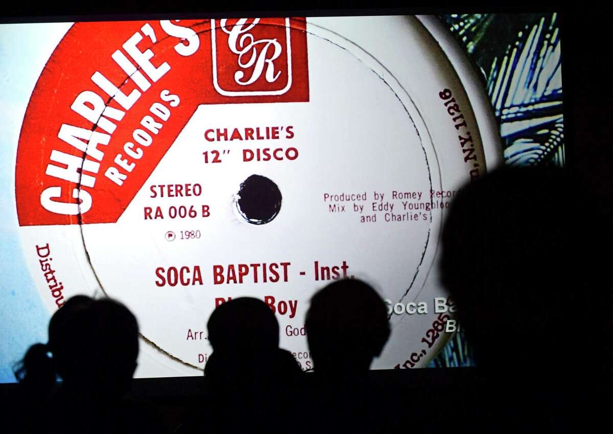 Audience members watch the documentary Charlie's Records about Ralston Charles and his Calypso record studio in New York City during The Norwalk Film Festival Saturday, Setember 28, 2019, in Norwalk, Conn.