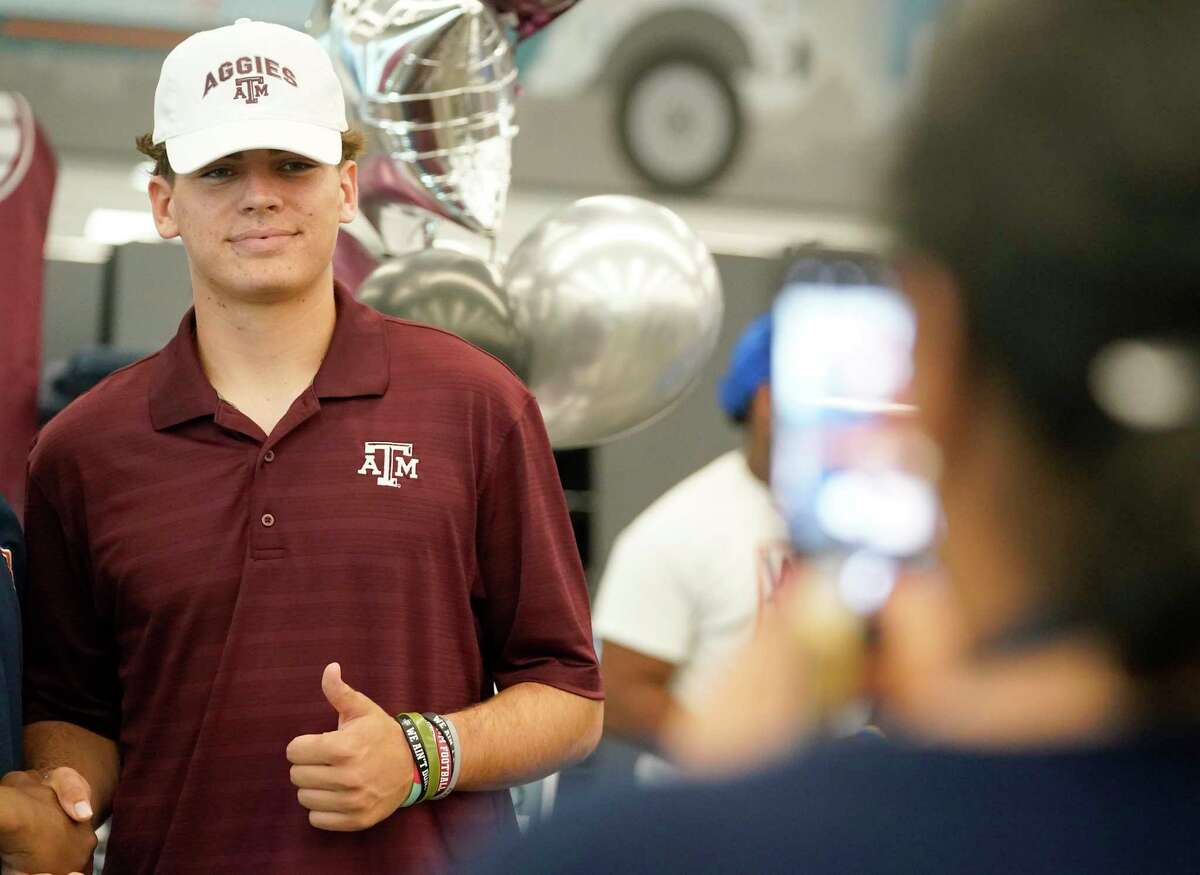 Bridgeland senior Conner Weigman, who is signing with Texas A&M, is shown during a signing event at Bridgeland High School, Wednesday, Dec. 15, 2021 in Cypress.