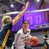 Albany forward Lucia Decortes (13) moves the ball against Canisius forward Ella Vaatanen (5) during an NCAA basketball game Wednesday, Dec. 15, 2021, in Albany, N.Y.