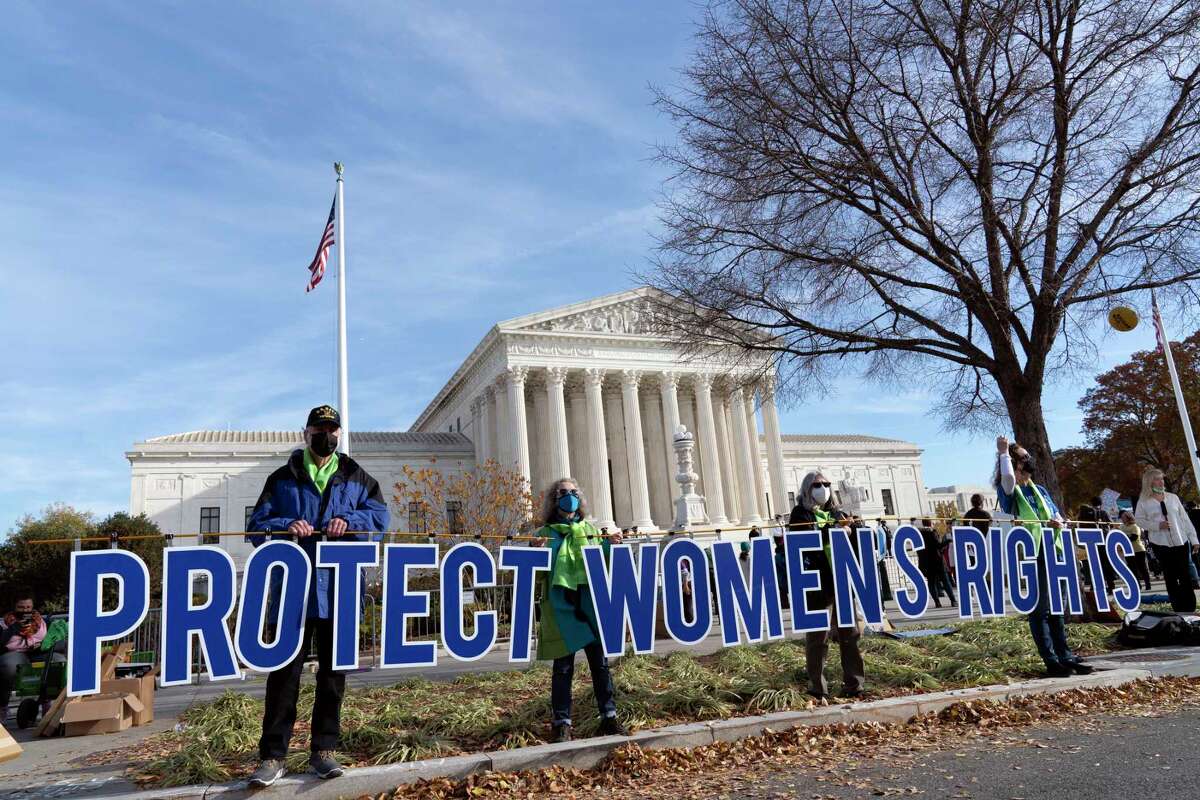 Abortion rights advocates demonstrate in front of the U.S. Supreme Court on Wednesday, Dec. 1, 2021, in Washington. 