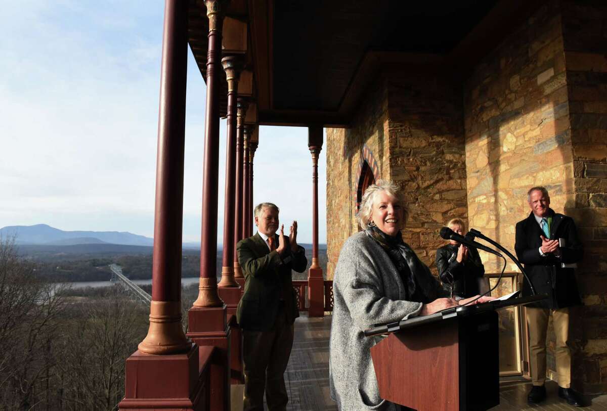 Assemblymember Didi Barrett (D) Dutchess/Columbia, is applauded after she announced securing $1 million for the Olana State Historic Site on Thursday, Dec.16, 2021, during a press conference at Olana in Greenport, N.Y.