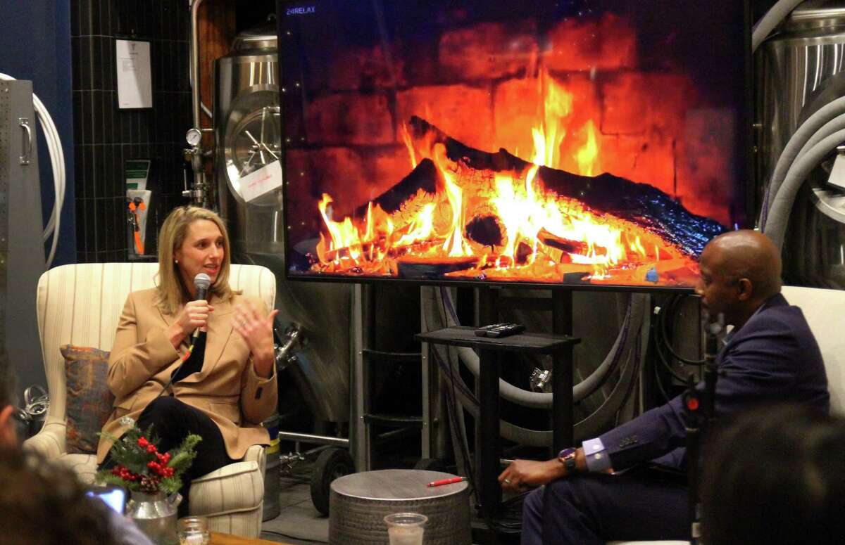 Mayor Caroline Simmons speaks at a “fireside chat” event held by the Stamford Partnership’s TechHub at Third Place by Half Full Brewery in Stamford, Conn., on Wednesday December 15, 2021. Seated at right is event moderator George Boyce.