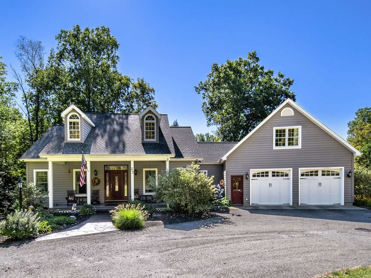 This week’s house is a one-level Cape style home at 272 Garner Road, Averill Park. It was built in 2008 on a 2.5-acre lot and has 2,102 square feet of living space. It has three bedrooms and two and a half bathrooms on the main level but there’s potential still on the table with this one: Both the upper level and the walk-out basement could be finished for more living space. Highlights include a large deck off the back of the house and a substantial outdoor living area with a fireplace, a recessed ceiling in the dining room and a second stone fireplace inside. Averill Park Schools. Taxes: $8,000. List price: $675,000. Contact listing agent Alex Monticello of Monticello Real Estate at 518-227-0718. 