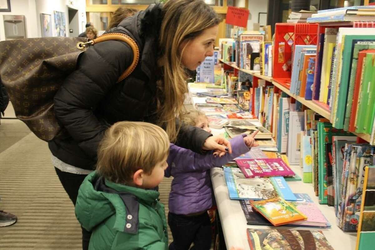 The Wilton Library’s annual Holiday Book Sale recently began at noon on Thursday, Dec. 2, 2021, and runs through Sunday, Jan. 2, 2022, during regular library hours. The regular library hours are: Mondays through Thursdays from 10 a.m. to 8 p.m. Fridays, from 10 a.m. to 6 p.m., Saturdays, from 10 a.m. to 5 p.m., and Sundays from 1 to 5 p.m. Shoppers at the 2019 Wilton Library Holiday Book sale are pictured.