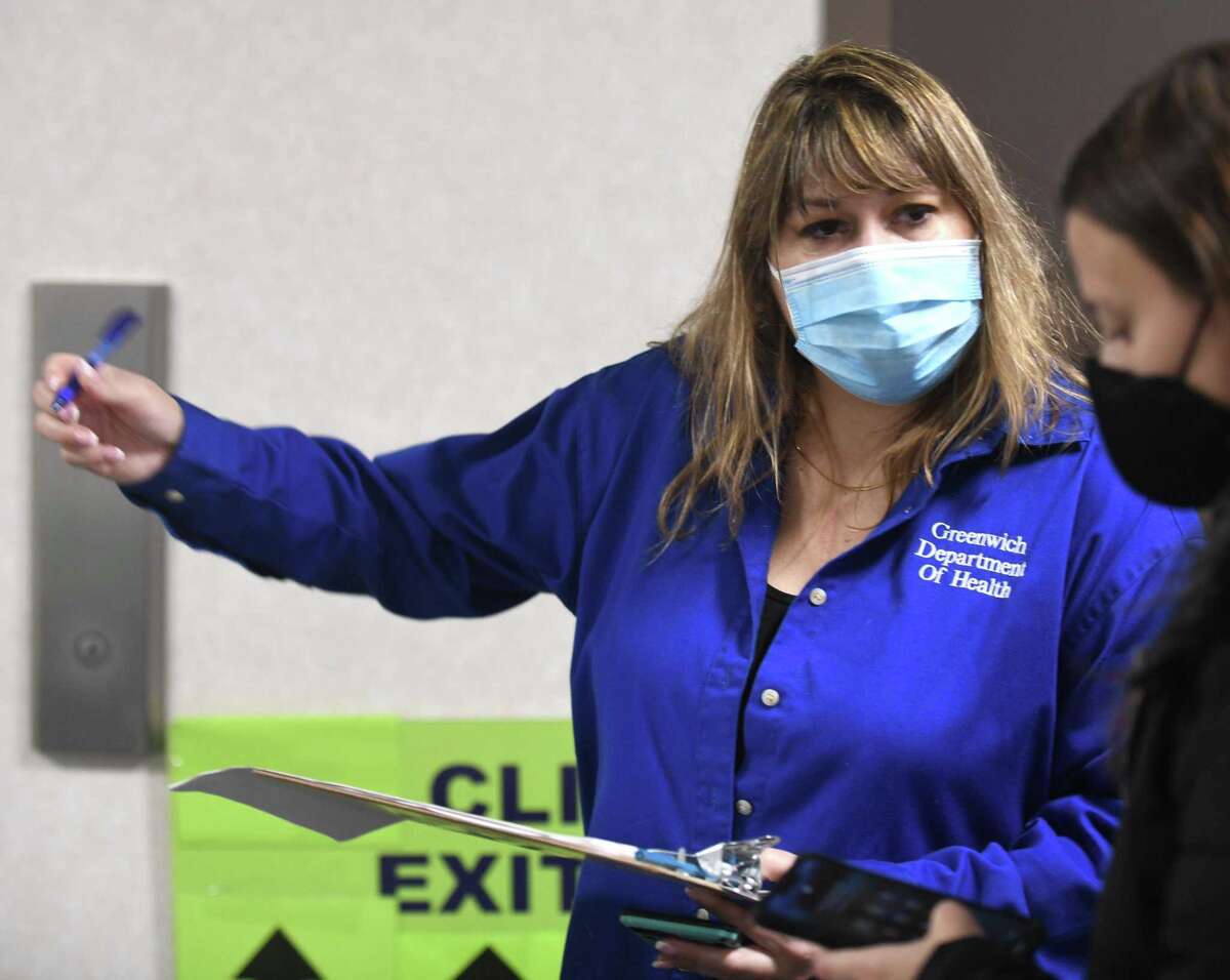 Greenwich’s health director urges residents to wear masks more often as