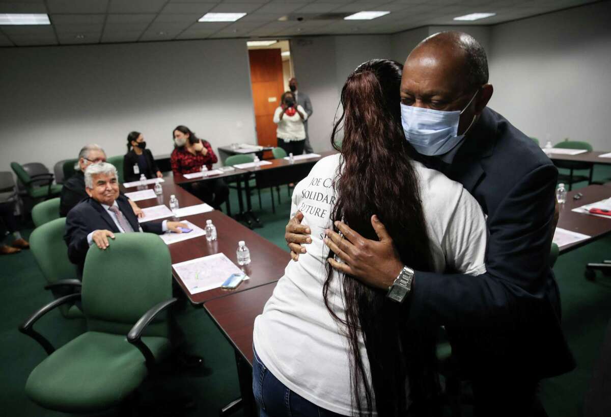 Houston Mayor Sylvester Turner hugs Janie Torres, the sister of Jose “Joe” Campos Torres, before a meeting to discuss a public memorial for her late brother Thursday, Dec. 16, 2021, at the City Hall Annex house in Houston. Campos Torres was a Mexican American veteran who fought in the Vietnam War. He was brutally beaten to death by Houston police officers and dumped in Buffalo Bayou in 1977.