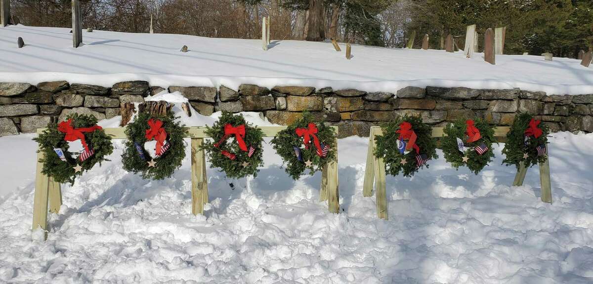 At 12 p.m. on Saturday, Dec. 18, Captain David Hawley of the Society Children of the American Revolution, Drum Hill Daughters of the American Revolution, and the Wilton Congregational Church will sponsor a Wreaths Across America wreath laying ceremony at the historic Sharp Hill Cemetery, located at the corner of Sharp Hill Road, and Route 7 Wilton. Wreaths are shown.