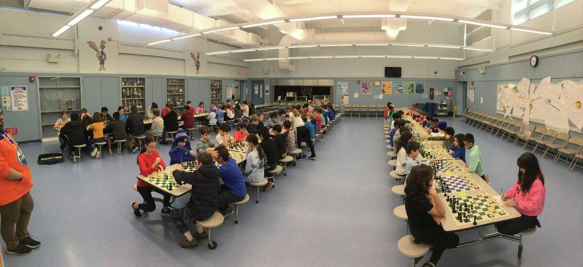 Gameplay in Riverfield's cafeteria at the Fairfield Regional tournament, which was co-sponsored by the Riverfield Club and the CT State Chess Association in March of 2020.