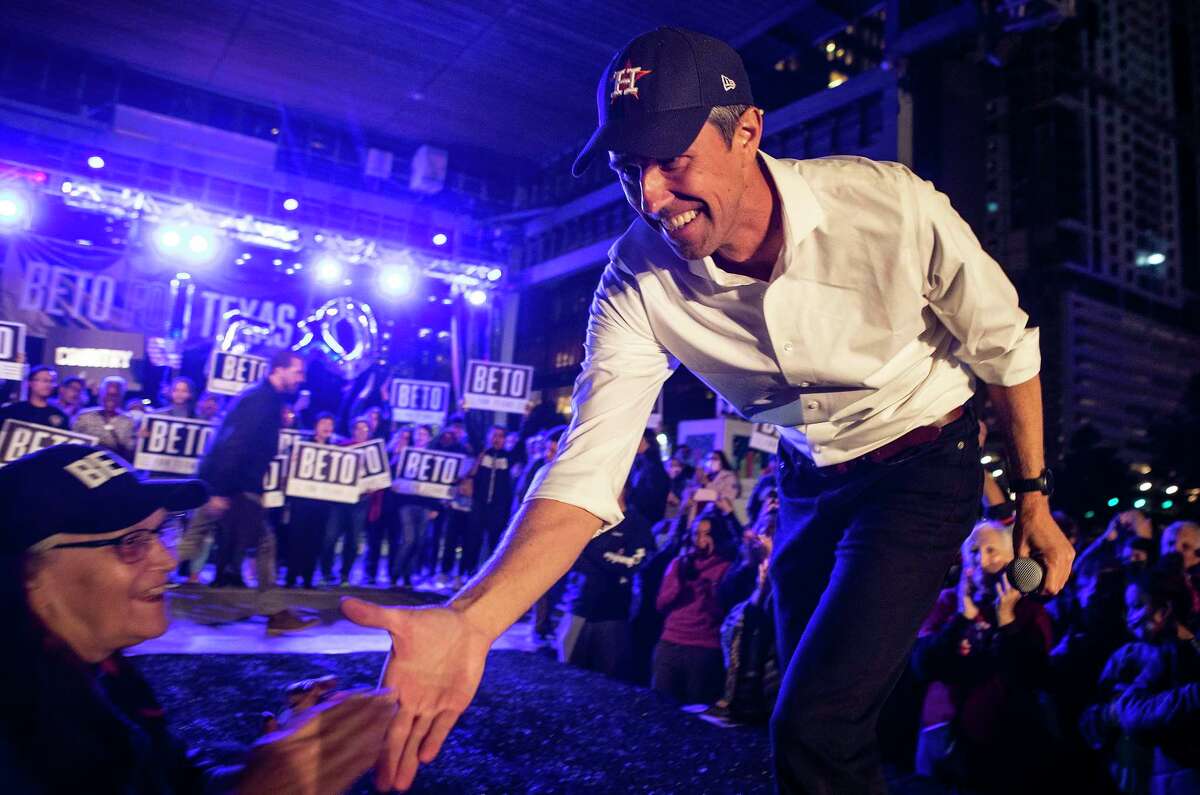 Democrat Beto O’Rourke shakes hands with supporters after speaking during a rally at Discovery Green as he announces that he is running for governor of Texas Friday, Nov. 19, 2021 in Houston.