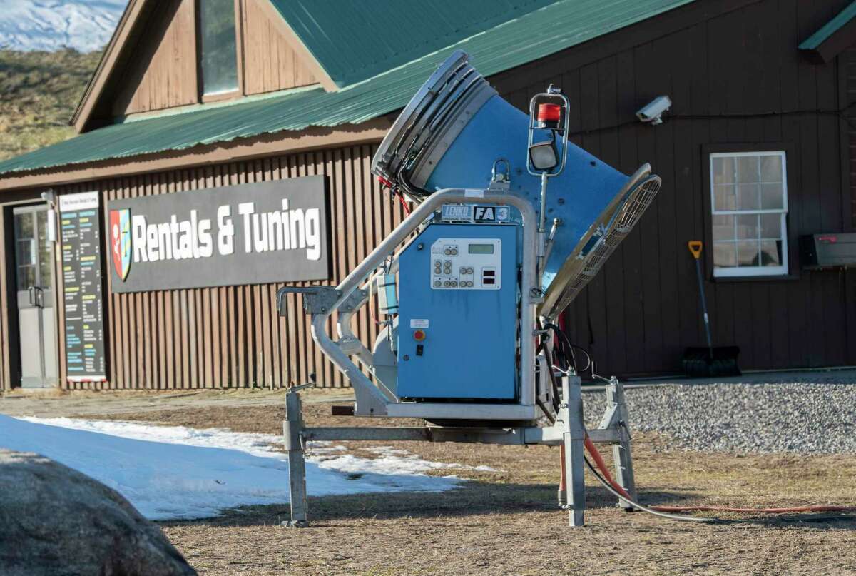 A snow making machine is seen at the base of West Mountain on Friday, Dec. 17, 2021 in Queensbury, N.Y. West Mountain is set to open a week from today on the 24th.