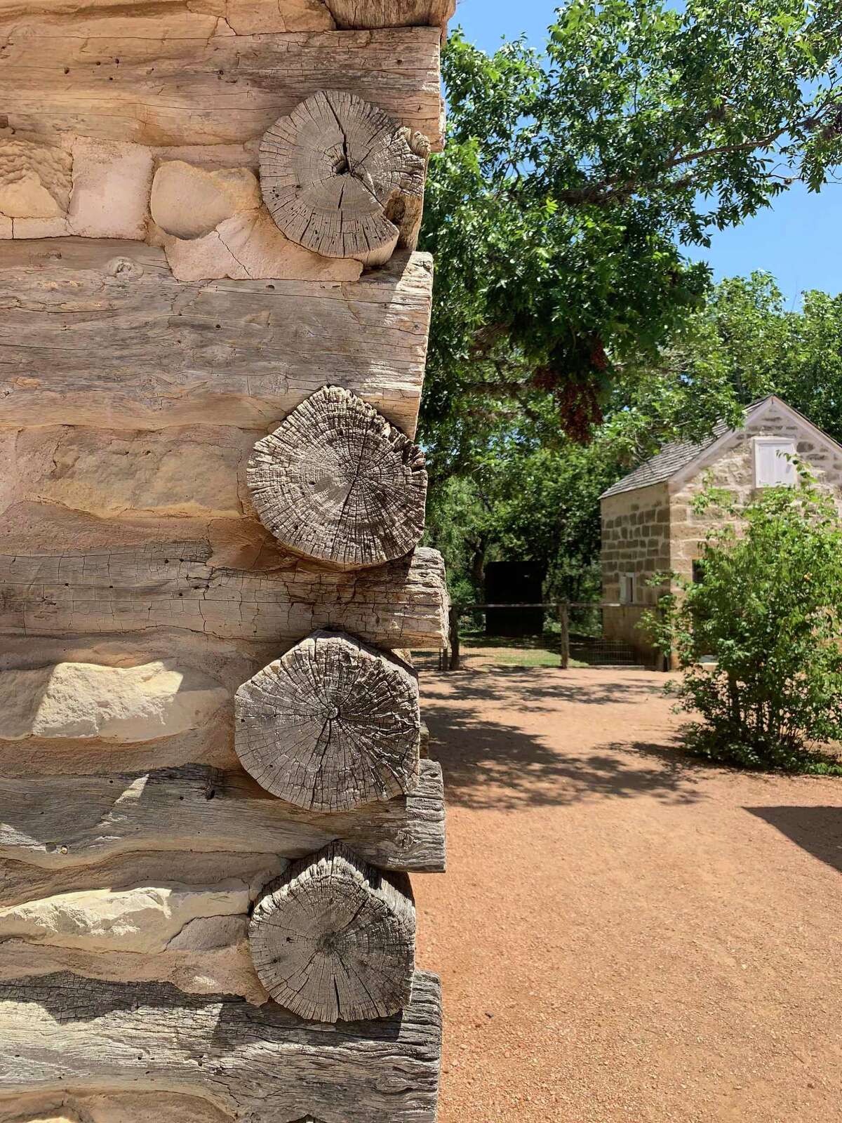 Most vernacular buildings were not designed by an architect and instead were built following local traditions, like the saddle notching of the Sauer-Beckmann Farm Farm, located in the Lyndon B. Johnson State Park & Historic Site in Gillespie County.