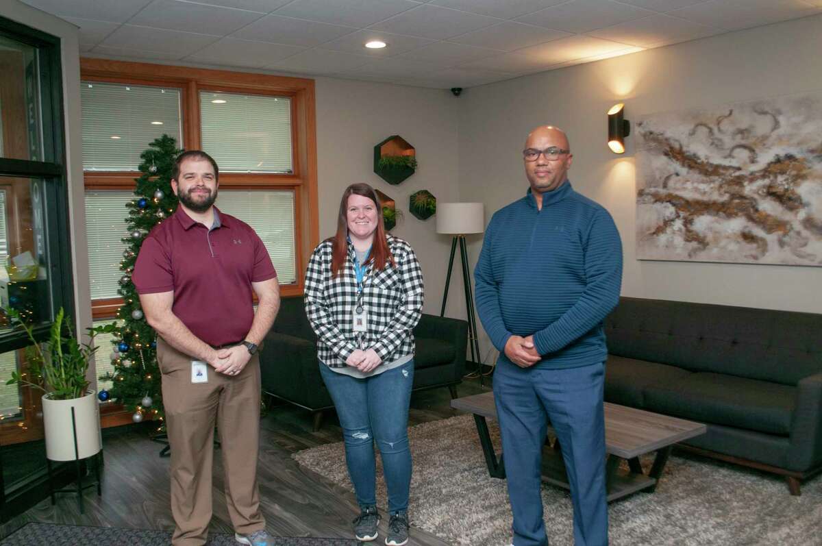 Outpatient counselors Bou Melton (left) and Katelyn Manley (center) stand with program director Winston Henry of Gateway Drug and Rehabilitation Center in Jacksonville. Gateway is reminding people that substance abuse problems can worsen during the holidays, especially as season stress piles on top of pandemic-related stress.