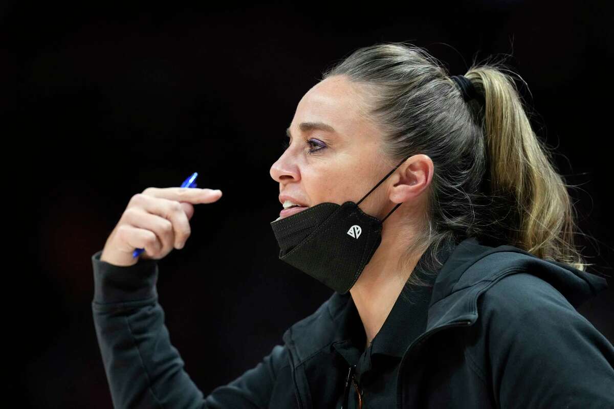 San Antonio Spurs assistant coach Becky Hammon directs players during the second half of the team's NBA basketball game against the Denver Nuggets on Friday, Oct. 22, 2021, in Denver. The Nuggets won 102-96. (AP Photo/David Zalubowski)