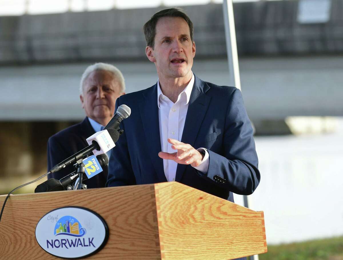 Congressman Jim Himes speaks during a press conference with Governor Ned Lamont announcing state aid for flood mitigation efforts Friday, December 17, 2021, at Municipal Parking lot on the Norwalk River in Norwalk, Conn.
