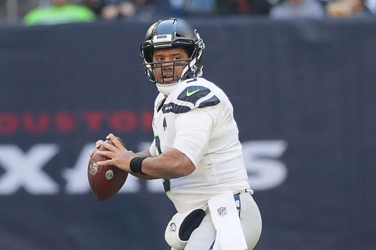 Seattle Seahawks quarterback Russell Wilson #3 against the Houston Texans at NRG Stadium on December 12, 2021 in Houston, Texas. (Photo by Bob Levey/Getty Images)