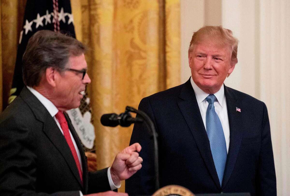 US President Donald Trump listens as Energy Secretary Rick Perry speaks about the administration's environmental policies at the White House in Washington, DC on July 8, 2019. (Photo by NICHOLAS KAMM / AFP)NICHOLAS KAMM/AFP/Getty Images