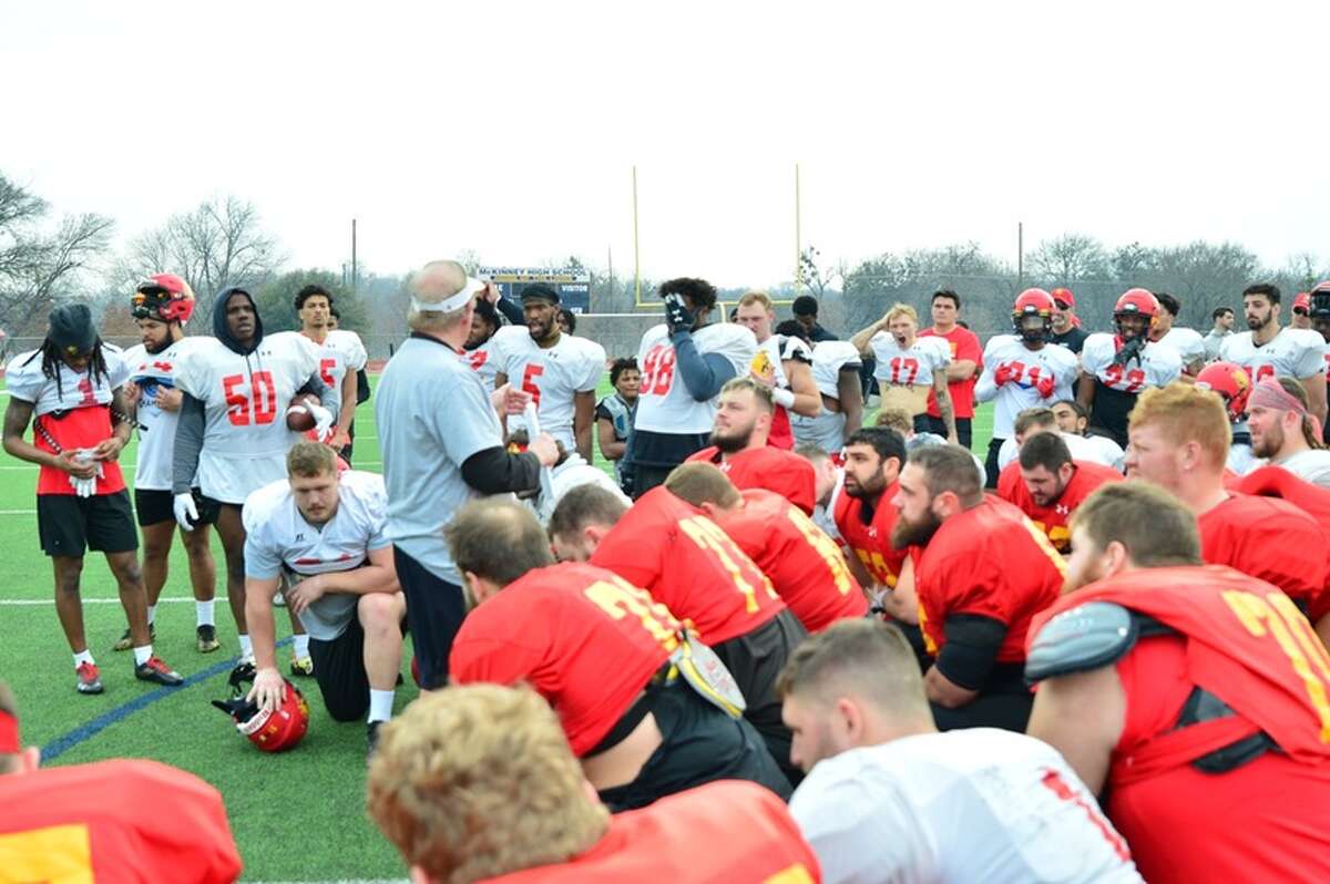 Ferris football players gather in a huddle during Thursday practices in McKinney, Texas.