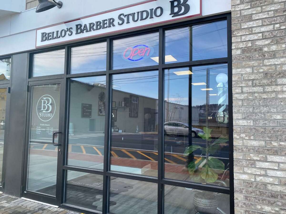 Shelton resident Claudio LoBello plying his trade at his barber shop, Bello’s Barber Studio, on Howe Avenue in the newly built Cedar Village at Carrolls.